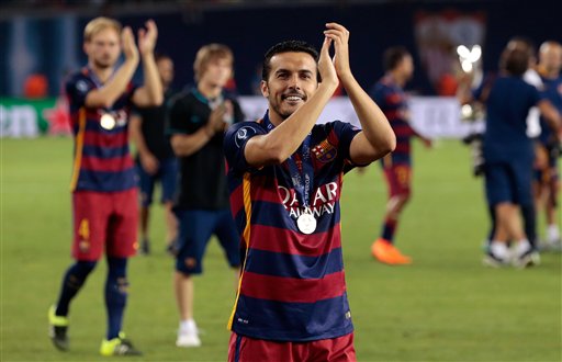 Barcelona's Pedro Rodriguez applauds the supporters after winning the UEFA Super Cup soccer match between FC Barcelona and Sevilla FC at the Boris Paichadze Dinamo Arena stadium in Tbilisi Georgia on Wednesday Aug. 12 2015. Barcelona won 5-4. (AP Pho