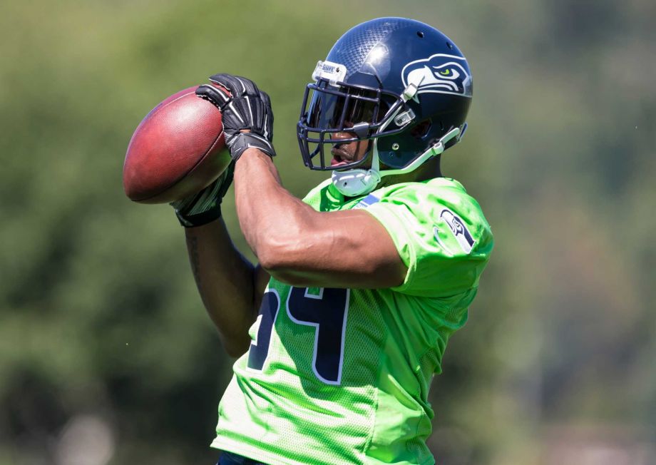 Seattle Seahawks linebacker Bobby Wagner catches a ball in drills during an NFL football training camp on Friday