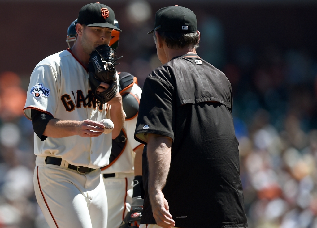 SAN FRANCISCO CA AUGUST 12 Manager Bruce Bochy #15 of the San Francisco Giants takes starting pitcher Chris Heston #53 out of the game against the Houston Astros in the top of the seventh inning at AT&T Park