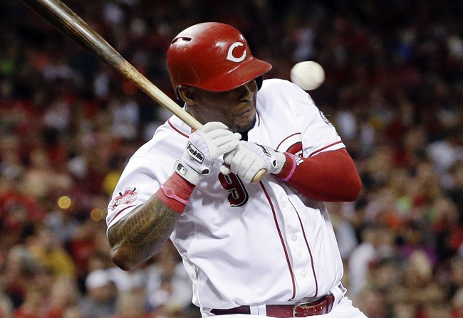 Cincinnati Reds Marlon Byrd is hit by a pitch from Pittsburgh Pirates relief pitcher Joe Blanton in the eighth inning of a baseball game Saturday Aug. 1 2015 in Cincinnati. The Reds won 4-3