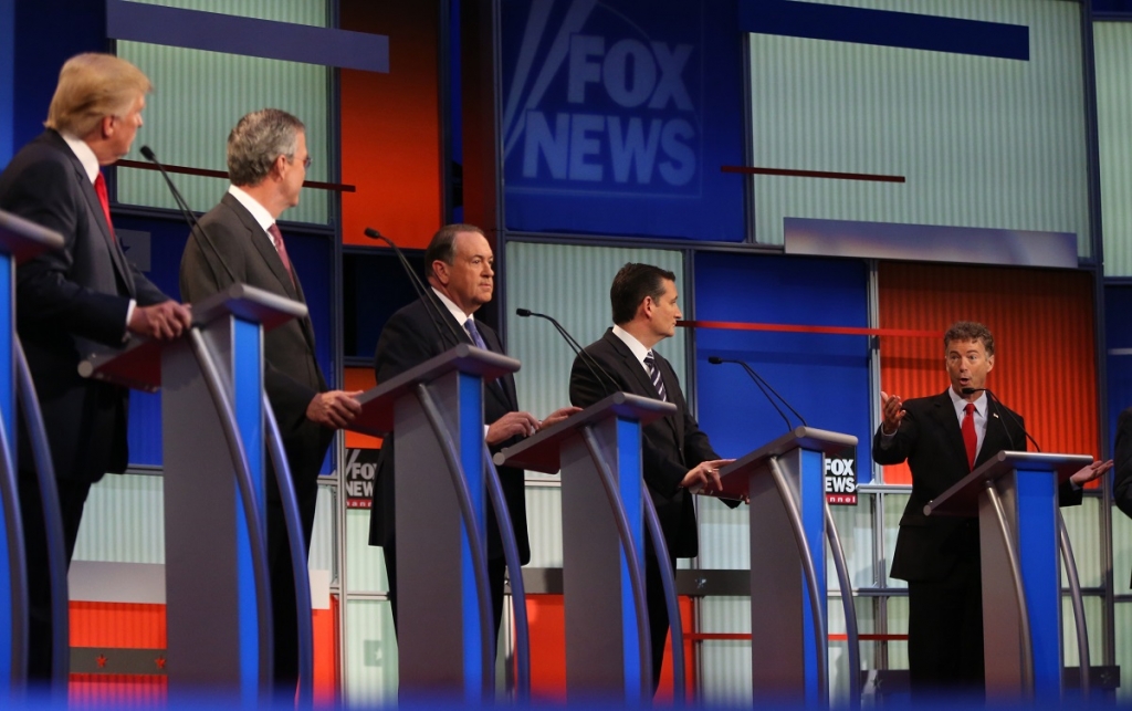 Republican presidential candidates from left Donald Trump Jeb Bush Mike Huckabee Ted Cruz and Rand Paul take the stage for the first Republican presidential debate at the Quicken Loans Arena Thursday Aug. 6 2015 in Cleveland