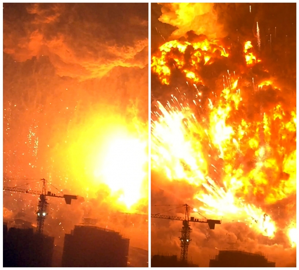 In this combination of Wednesday Aug. 12 2015 images taken from video provided by Dan Van Duren a warehouse explodes in Tianjin China as filmed from a nearby residential building. Tianjin is the world's 10th largest port