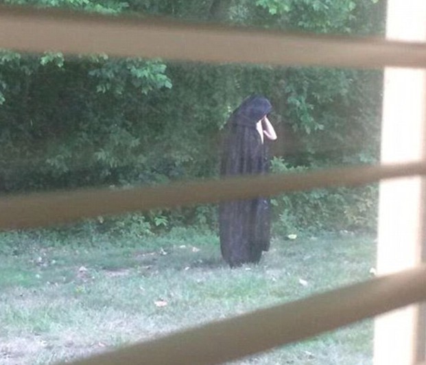 There's a creepy guy in a cloak dropping raw meat in playgrounds