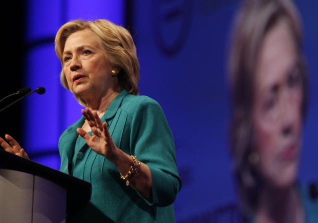 Democratic presidential hopeful Hillary Clinton speaks at the National Urban League's conference in Fort Lauderdale Fla. where she criticized Jeb Bush's record as the Sunshine State's governor on Friday