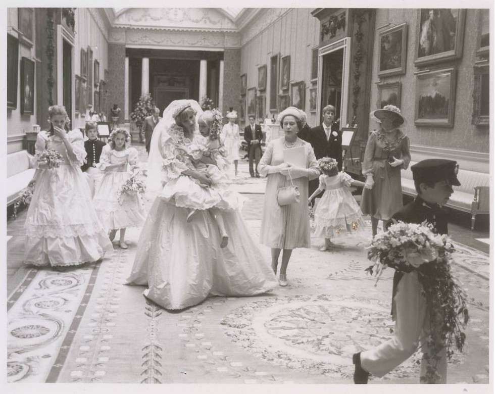 Princess Diana holds her youngest bridesmaid