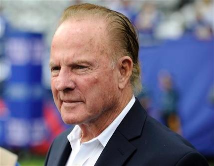 In 2013 Frank Gifford looks on before a game between the New York Giants and the Denver Broncos. Gifford's family said Sunday that Gifford died suddenly of natural causes. He was 84