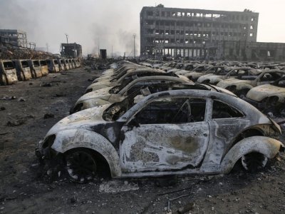 Burnt-out vehicles at Tianjin explosion site