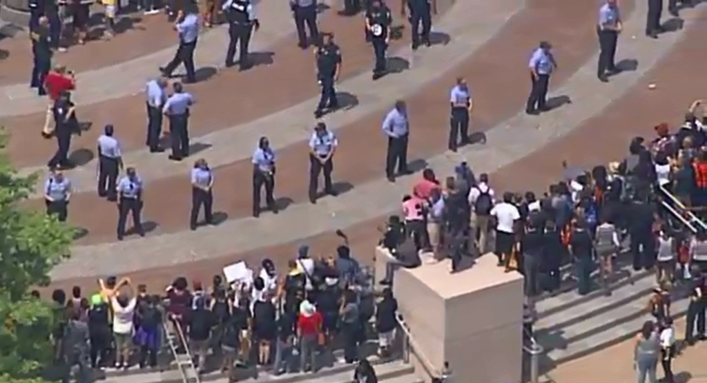 Protesters gather at federal courthouse in St. Louis the day after the anniversary of Michael Brown's death