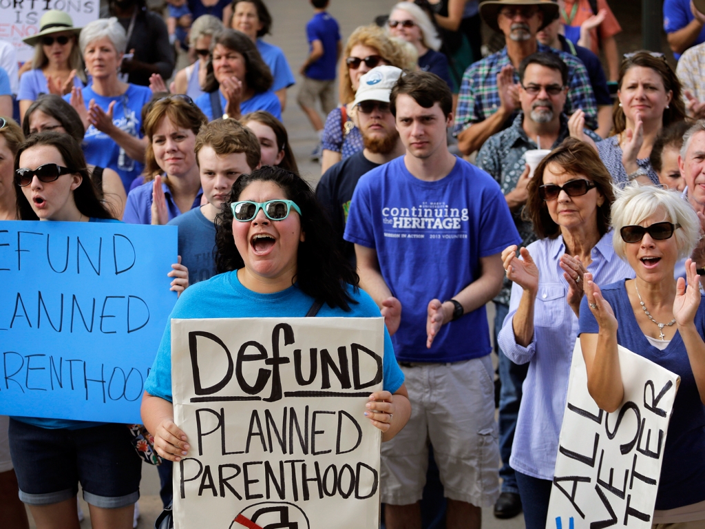 Protesters rally on the steps of the Texas state capitol on July 28 to condemn the use of fetal tissue for medical research.    Eric Gay    
  AP