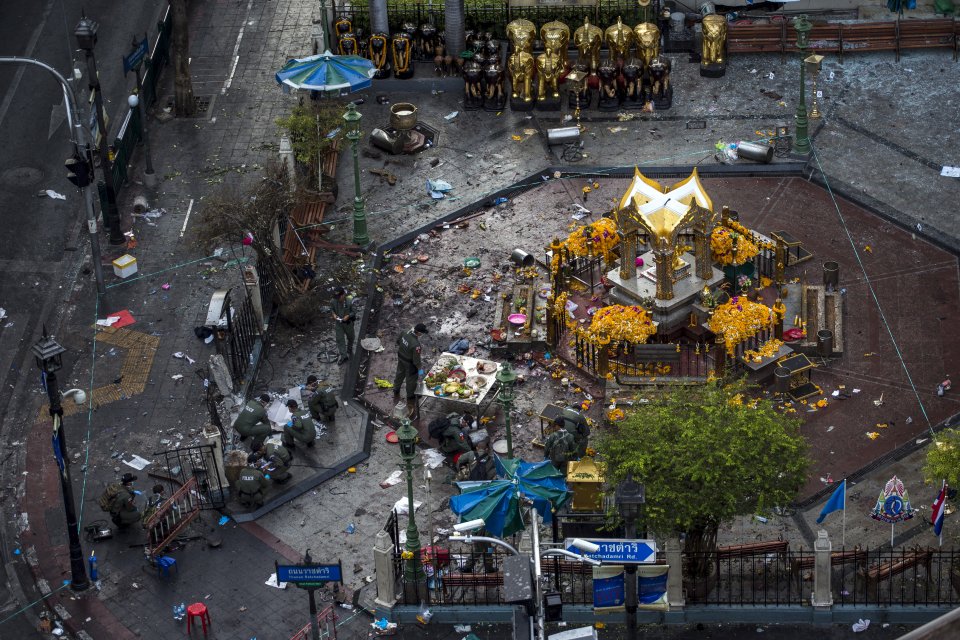 REUTERS  Athit Perawongmetha Experts investigate the Erawan shrine at the site of a deadly blast in central Bangkok Thailand