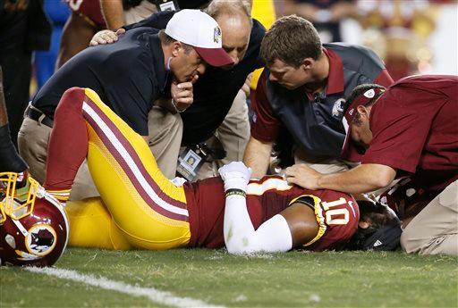 Dan Snyder dances to Wobble Baby while bowling with RG3