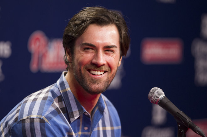 Philadelphia Phillies starting pitcher Cole Hamels walks off the field after the eighth inning against the Chicago Cubs at Wrigley Field