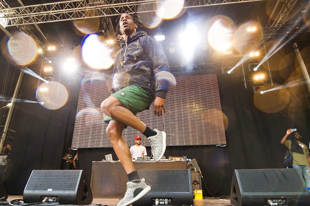 Travi$ Scott's Lollapalooza Set Cut Short After He Urges Fans to Rush the