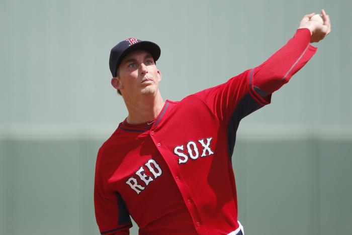 Boston Red Sox starting pitcher Henry Owens delivers against the Pittsburgh Pirates during the first inning during an exhibition spring training baseball game Saturday