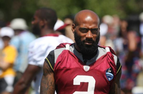 Washington Redskins cornerback De Angelo Hall walks the sidelines