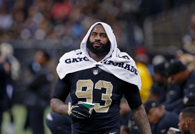 New Orleans Saints outside linebacker Junior Galette walks along the bench during an NFL football game against the Baltimore Ravens in New Orleans.A defense that ranked second-to-last in the NFL last season has