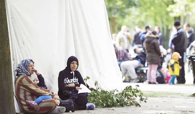 Germany to expect 750,000 refugees in 2015 – Reports