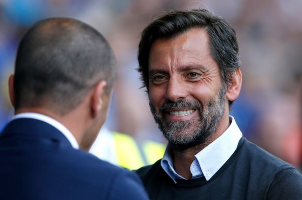 Roberto Martinez greets Quique Sanchez Flores