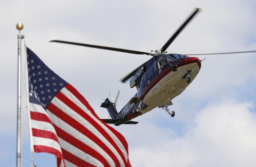 US Republican presidential candidate Donald Trump's helicopter lands in a field before his visit to the Iowa State Fair during a campaign stop in Des Moines Iowa United States