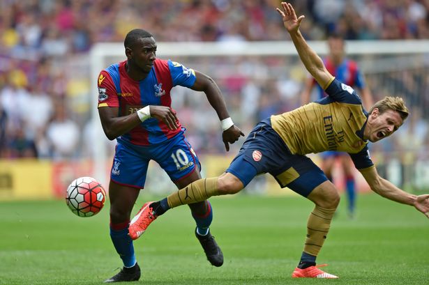 Nacho Monreal falls in front of Yannick Bolasie