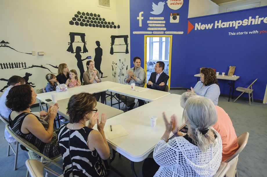 Connecticut Governor Dannel Malloy speaks with a small group of people during a round table on gun control at Hillary Clinton's Manchester NH headquarters on Tuesday