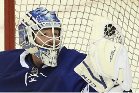 Leaf goalie Jonathan Bernier snakes a hard shot out of the air for a nice save