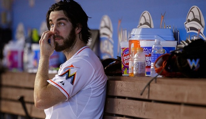 Miami Marlins starting pitcher Dan Haren throws in the first inning of a baseball game against the Washington Nationals Thursday