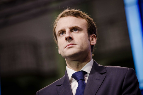 France's Economy Minister Emmanuel Macron looks on during the