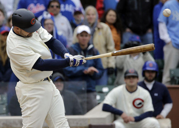 Chicago Cubs Chris Coghlan right steals second base as Milwaukee Brewers shortstop Jean Segura tries to apply the tag during the third inning of a baseball game Tuesday Aug 11 2015 in Chicago