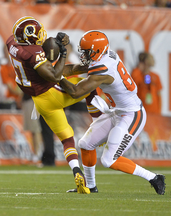 Washington defensive back Akeem Davis intercepts a pass intended for Cleveland's Vince Mayle on Thursday Aug. 13 2015