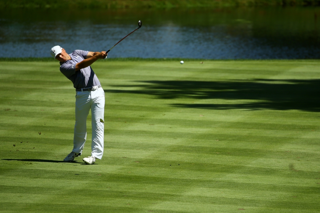 AKRON OH- AUGUST 07 Jordan Spieth plays his second shot on the second hole during the second round of the World Golf Championships- Bridgestone Invitational at Firestone Country Club South Course