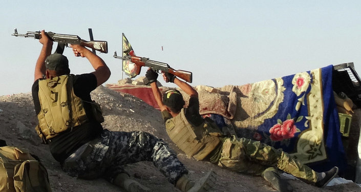 Iraqi security forces defend their positions against Islamic State group attack in Husaybah 5 miles east of Ramadi Iraq