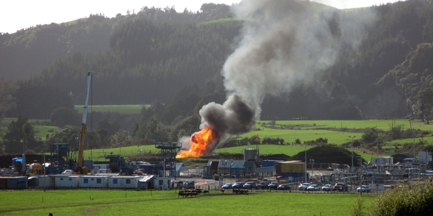 SAME OLD SAME OLD Gas flare from a Todd Energy well on farmland at Rimutauteka Road