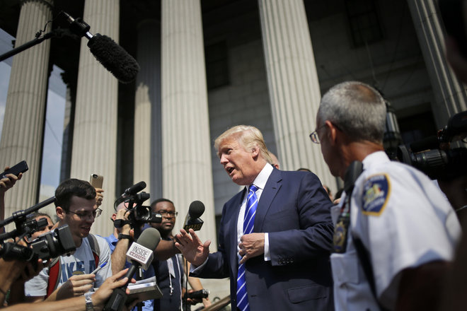 Republican presidential candidate Donald Trump leaves the courthouse after serving on jury duty in New York Monday Aug. 17 2015. The Republican presidential candidate reported for jury duty in Manhattan on Monday and spent much of the day like everyone