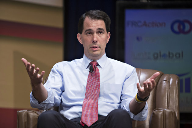 Scott Walker speaks during a private gathering of influential Republican donors hosted by the Koch brothers