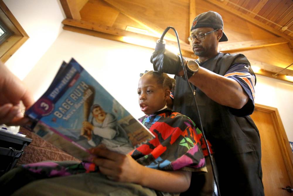 This barber gave a free haircut to any kid who'd read him a story