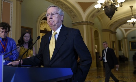 Senate Majority Leader Mitch Mc Connell of Ky. speaks to reporters on Capitol Hill in Washington Thursday