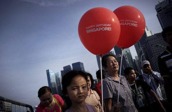 Singapore turns 50 hailing achievements, heeding discontent