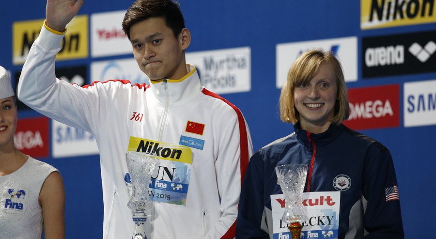 China's Sun Yang left and United States&#39 Katie Ledecky present the awards as best athletes of the competition at the end of the Swimming World Championships in Kazan Russia Sunday Aug. 9 2015