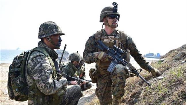 2015 showing the country’s soldiers on patrol near the scene of a recent landmine explosion