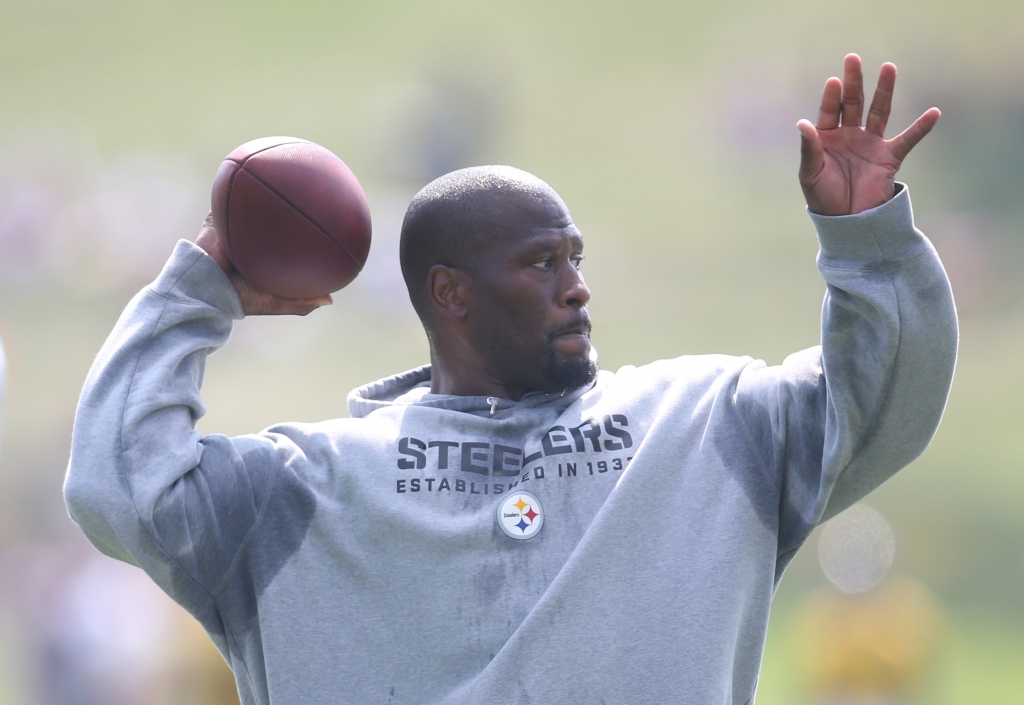 Steelers linebacker James Harrison takes part in drills