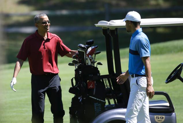 Steven Senne  AP  President Barack Obama chats with Stephen Curry during their golf game at Farm Neck Golf Club in Oak Bluffs Mass