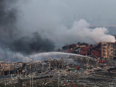 At least 50 dead after blasts rock Tianjin