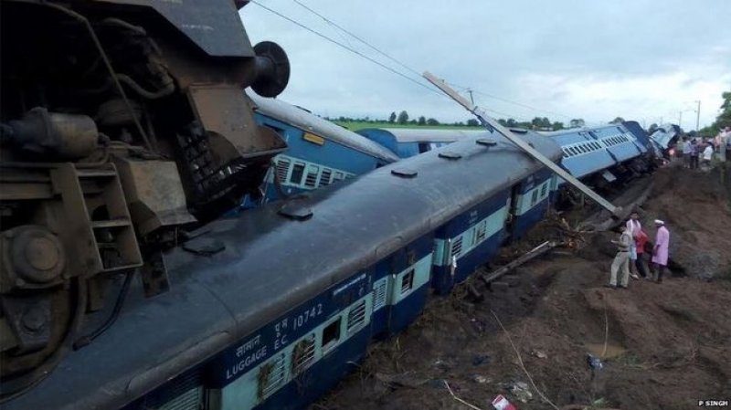 The trains were crossing a partially flooded bridge when they derailed