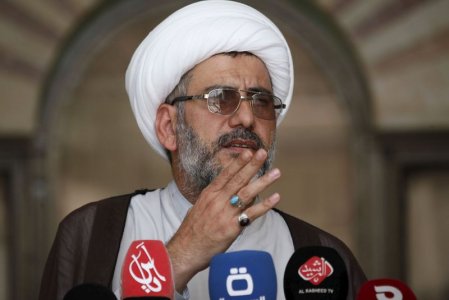 Salah al-Obeidi a spokesman for Shi'ite cleric Moqtada al-Sadr speaks during a news conference in the holy city of Najaf Iraq