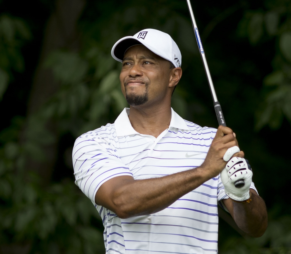 Tiger Woods says he returning to form- despite another flop