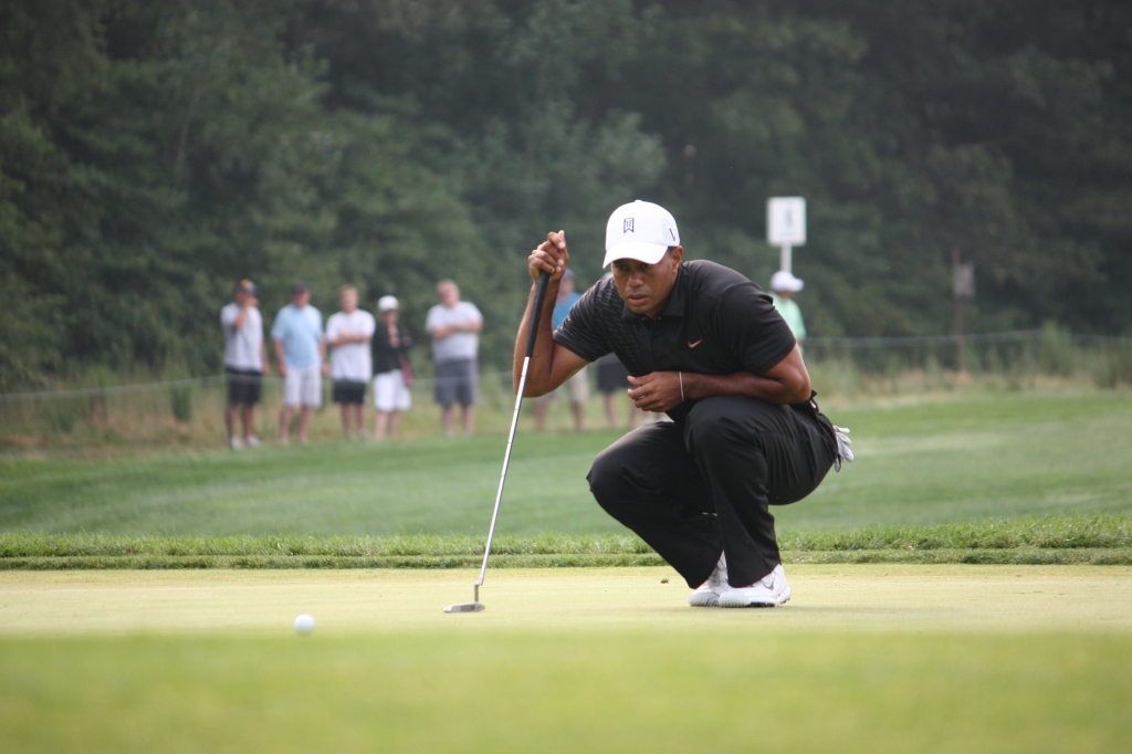 Tiger Woods plays golf at The Barclays at Bethpage State Park in New York