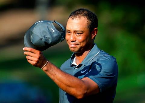 Tiger Woods reacts after his par putt on the 18th green during the second round of the Wyndham Championship at Greensboro North Carolina