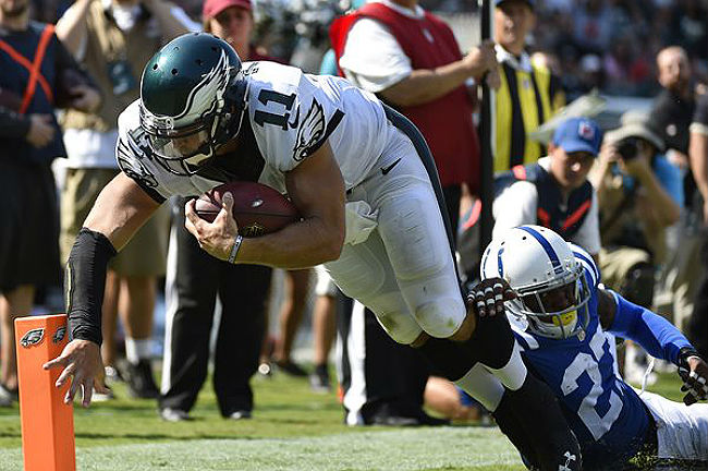 Philadelphia Eagles quarterback Tim Tebow dives for a touchdown against the Colts on Sunday