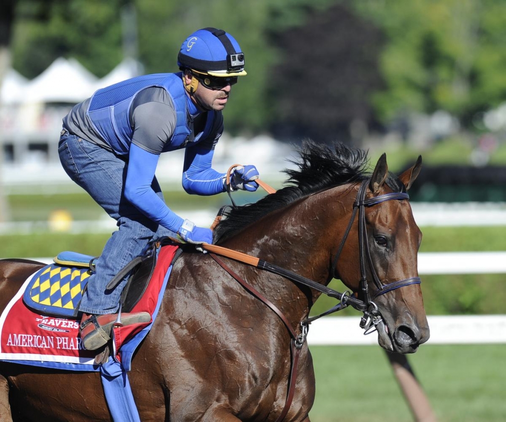 Jockey Victor Espinoza eased American Pharoah to the wire for a 2¼-length victory over Keen Ice on the 1 1/8-mile course finishing in 1 minute 47.95 seconds